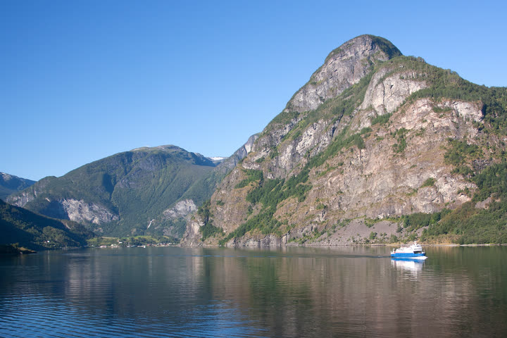 Sognefjord water, village, and mountains used for route timing decisions